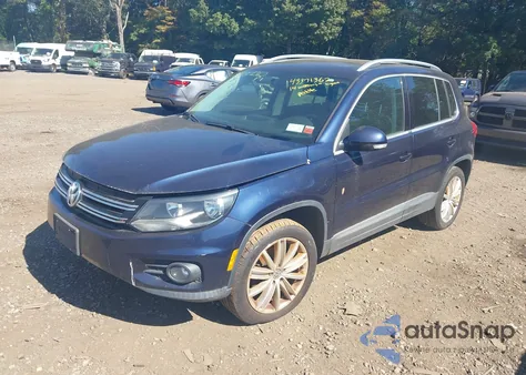 2014 Volkswagen Tiguan Sel from USA, damaged, VIN WVGBV3AX8EW573932